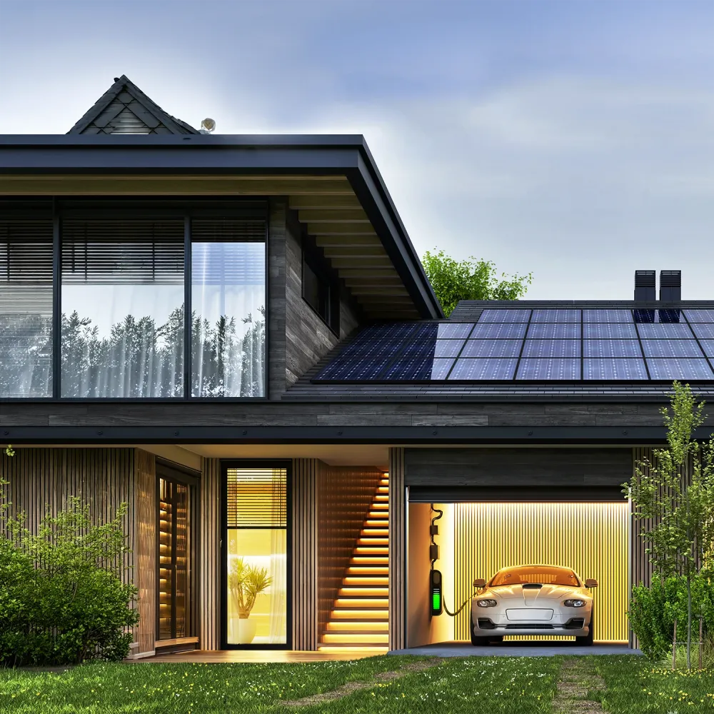 Modern two-story house with rooftop solar panels, illuminated interior, and an electric car charging in an integrated garage at dusk.